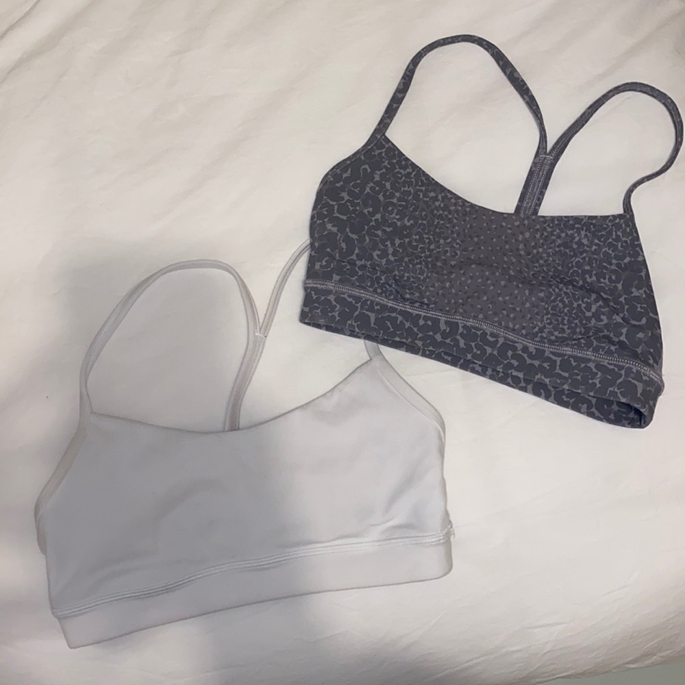 1 grey and 1 white lululemon sports bra